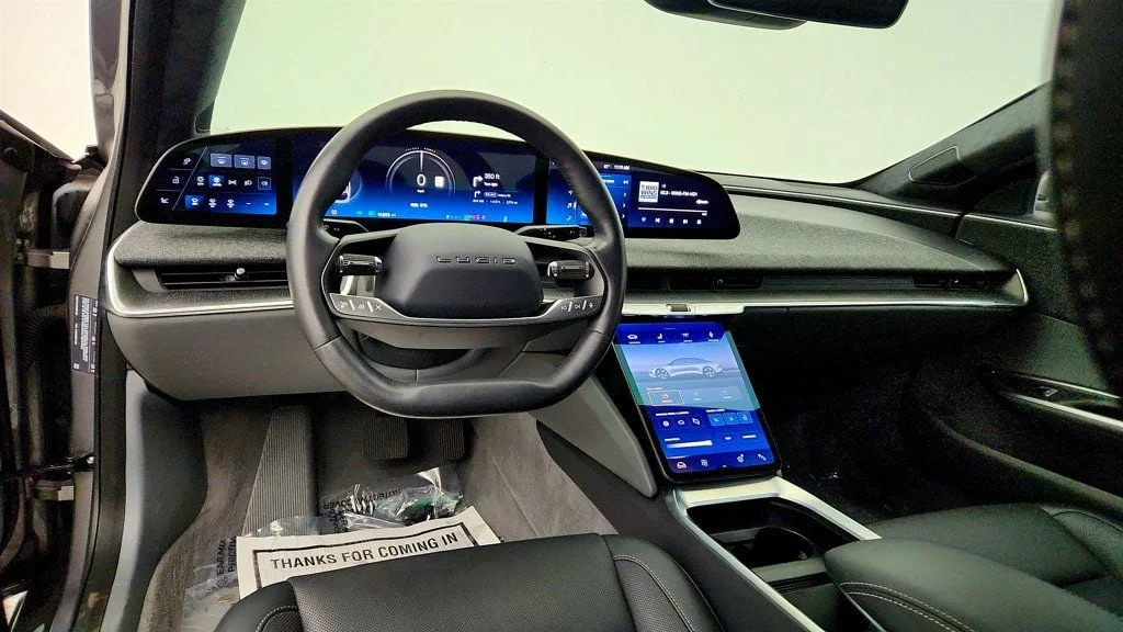 Used 2023 Cosmos Silver Metallic Lucid Pure AWD with 19