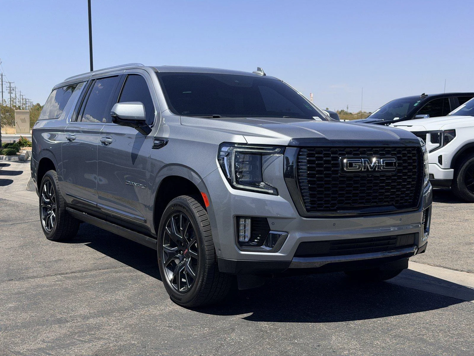 Used 2024 Sterling Metallic GMC Denali Ultimate image 1