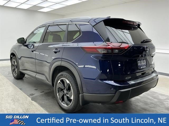 Used 2024 Deep Ocean Blue Pearl Nissan SV image 6