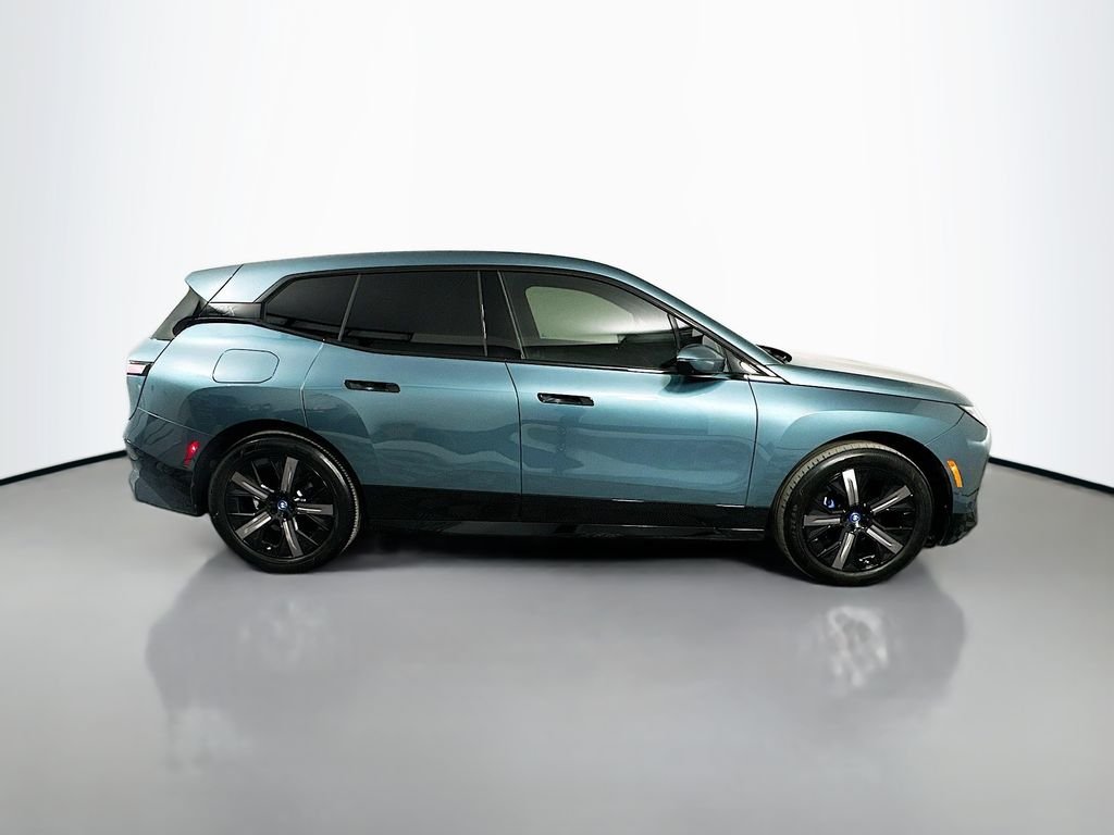 Used 2024 Blue BMW xDrive50 image 4