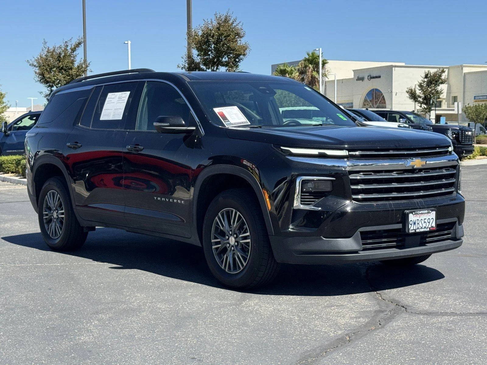 Used 2024 Mosaic Black Metallic Chevrolet LT image 1