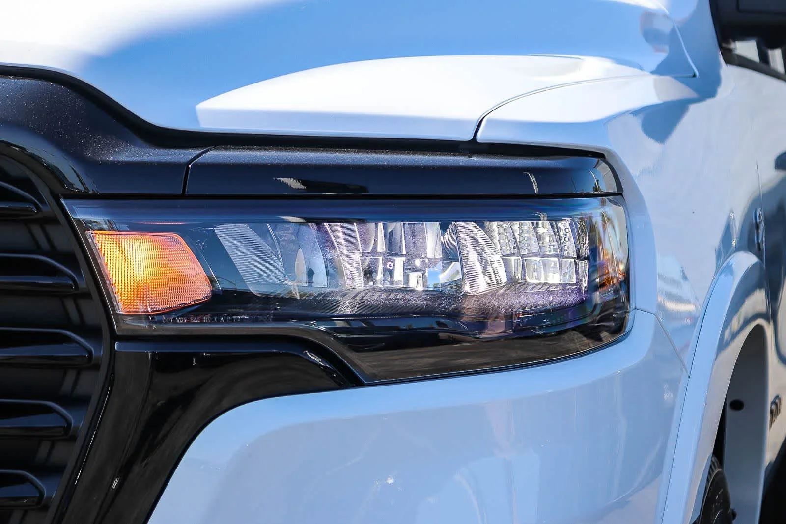 New 2026 Bright White Clear-Coat Exterior Paint RAM Laramie image 8