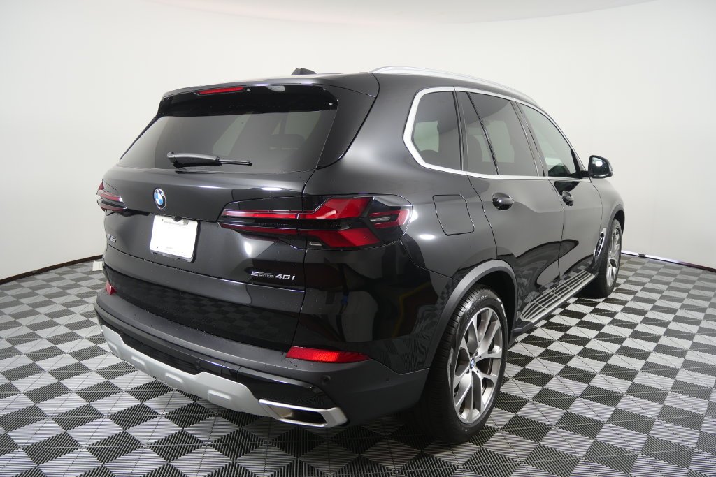 Certified Used 2024 Black Sapphire Metallic BMW sDrive40i image 4