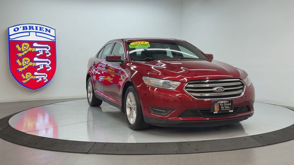 Used 2014 Ford Taurus SEL with VIN 1FAHP2E8XEG128775 for sale in Normal, IL