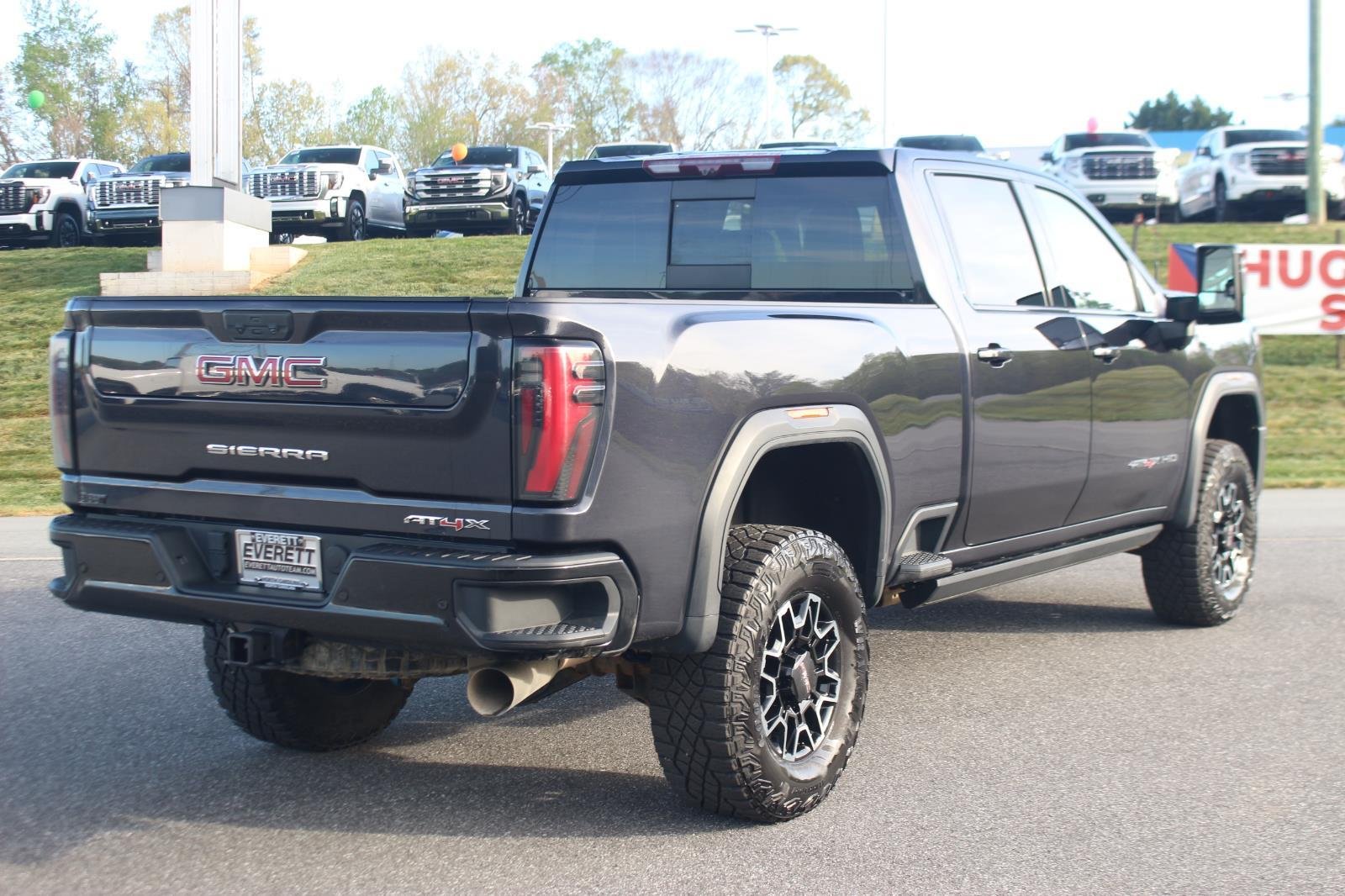 Used 2024 Titanium Rush Metallic GMC AT4X image 7