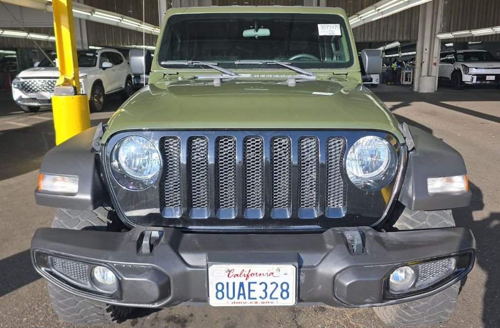Used 2021 Jeep Wrangler Unlimited Willys Sport with VIN 1C4HJXDG9MW519132 for sale in Kansas City