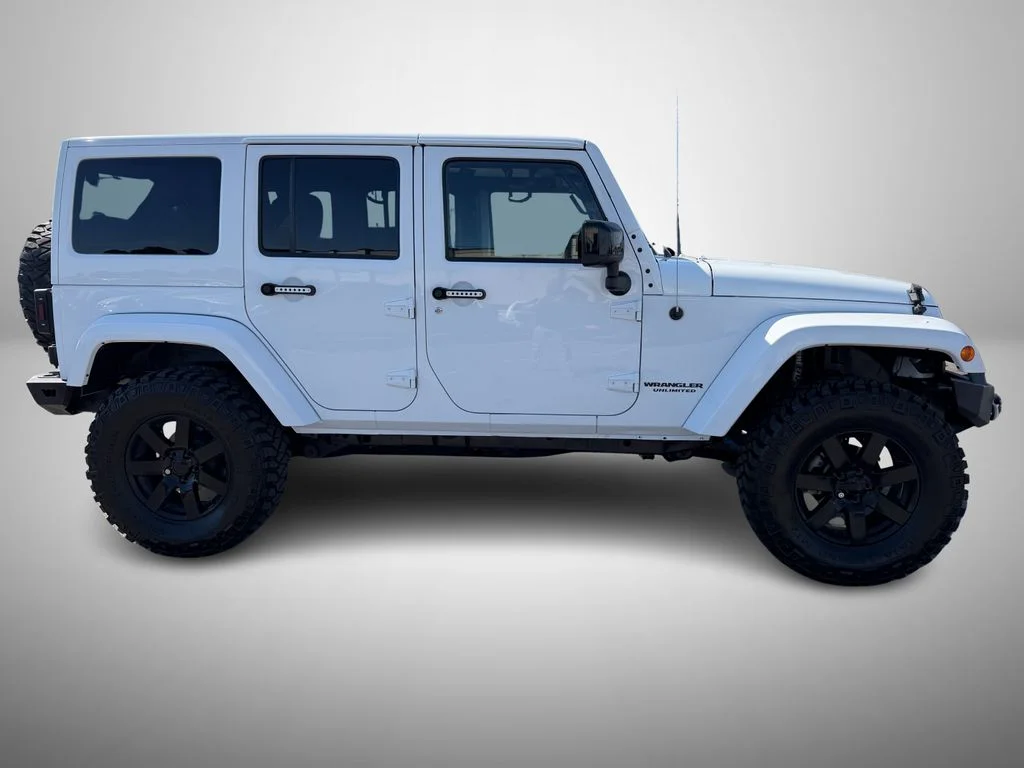 Used 2014 White Jeep Unlimited Sahara image 6