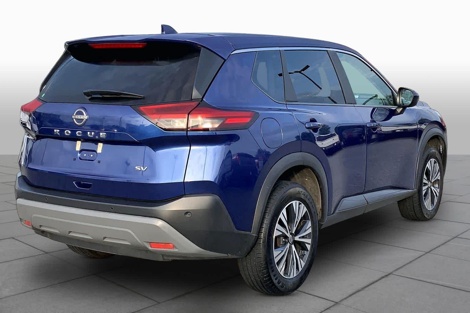 Used 2023 Caspian Blue Metallic Nissan SV image 12