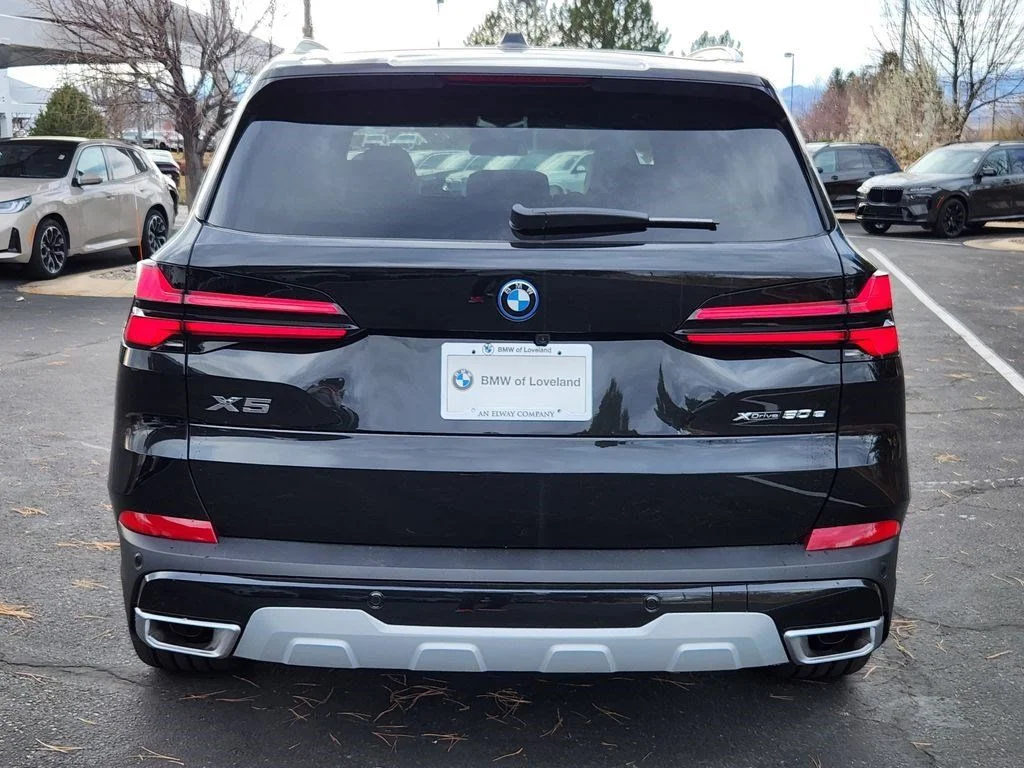 Used 2026 Black BMW xDrive50e image 4