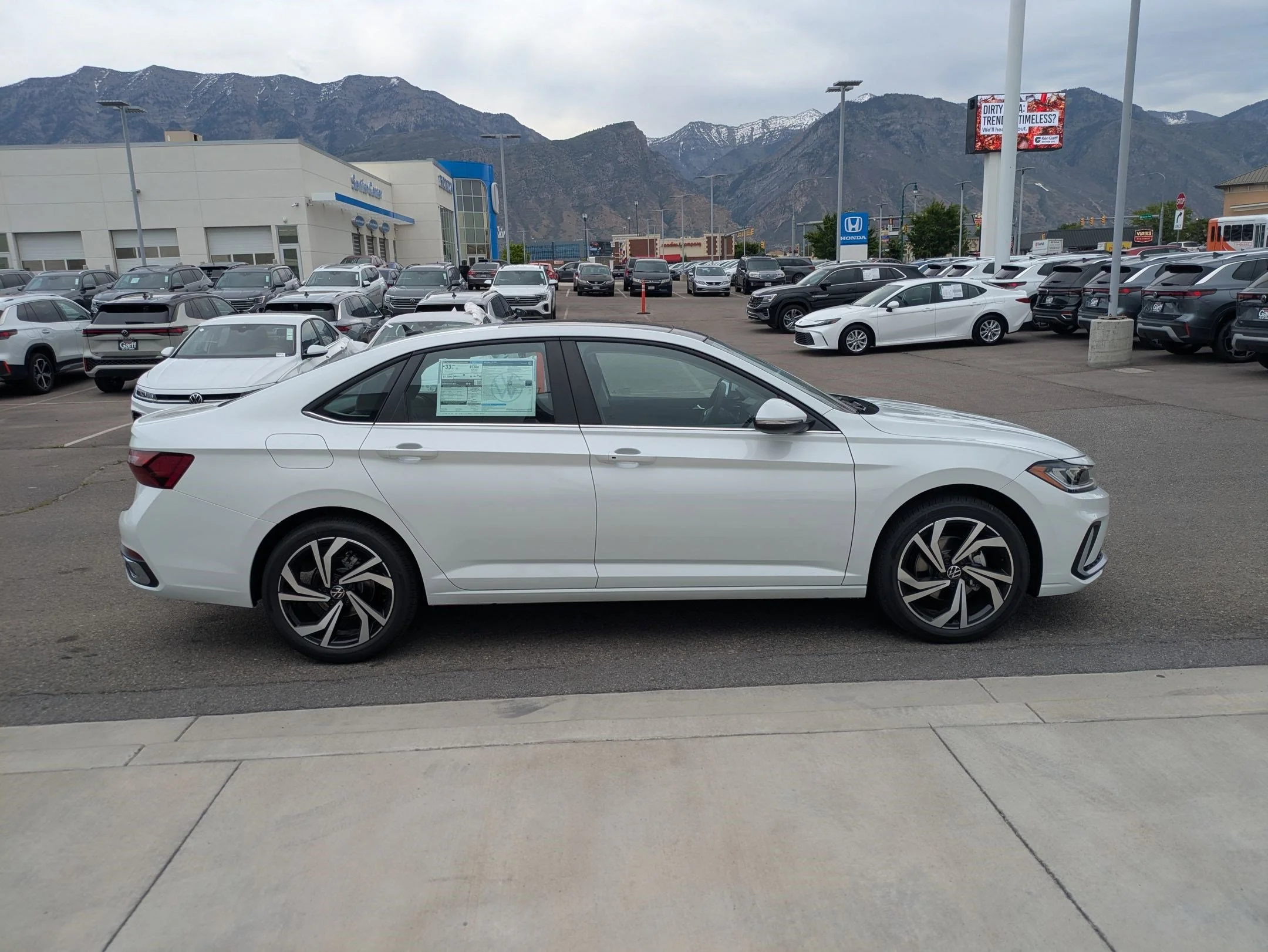 New 2026 Opal White Pearl Volkswagen SEL image 2