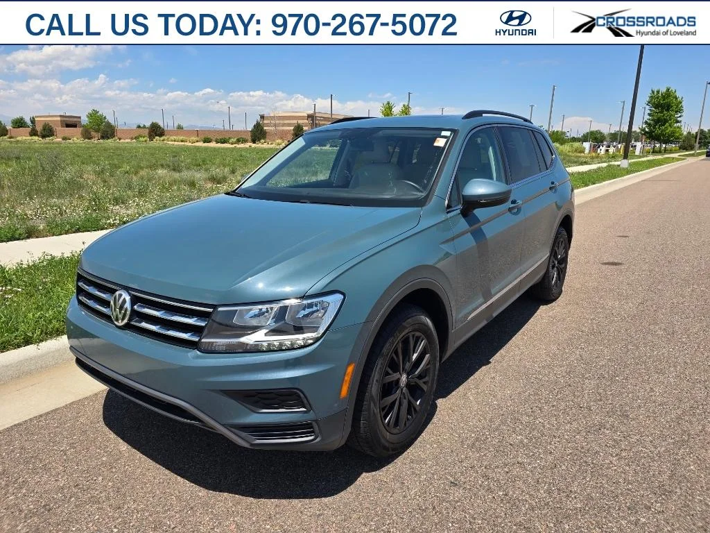Used 2020 Stone Blue Metallic Volkswagen SE image 1