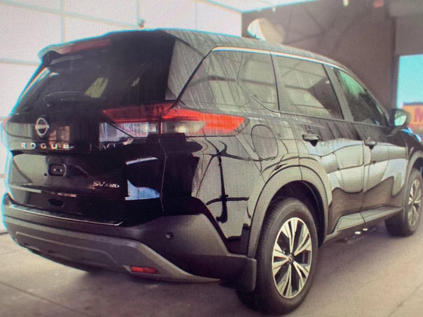Used 2023 Super Black Nissan SV image 2