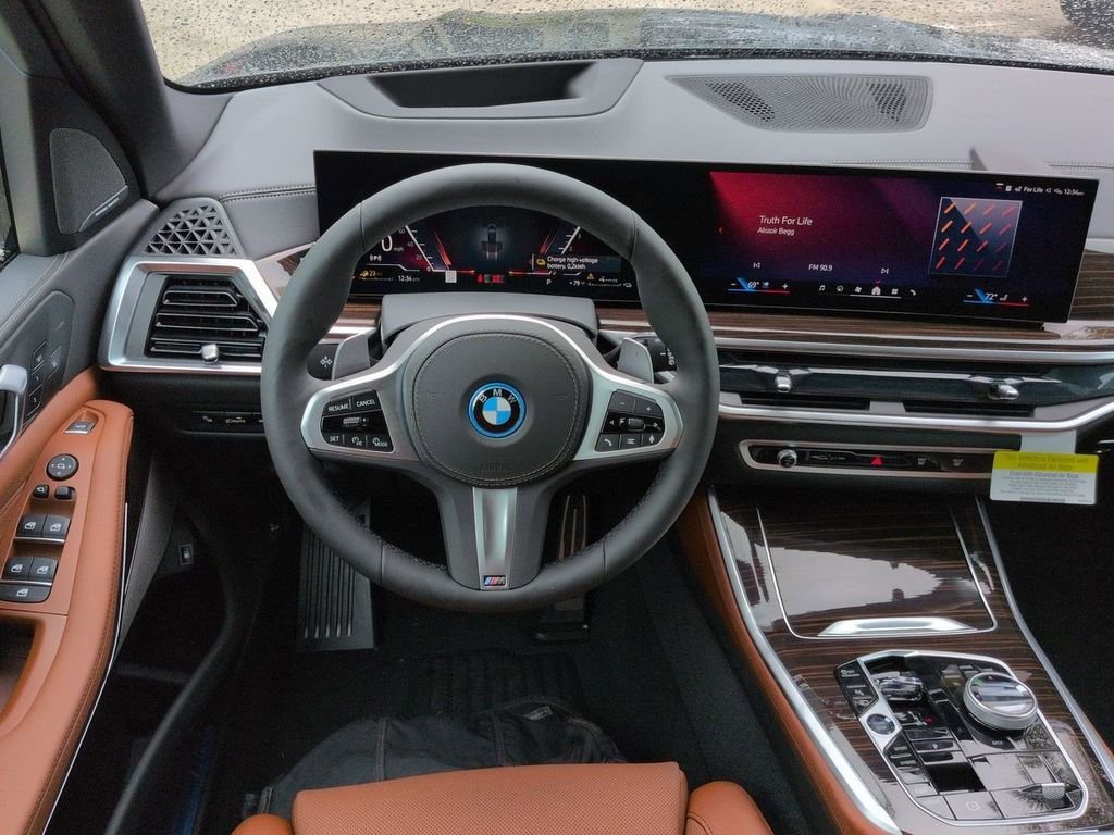 New 2026 Black Sapphire Metallic BMW xDrive50e image 16