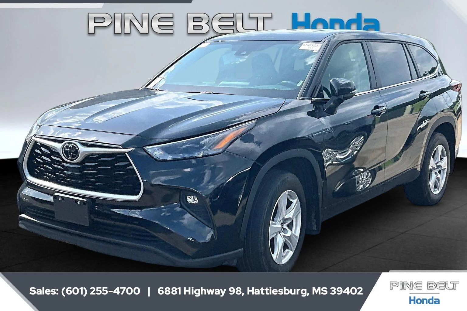 Used 2024 Midnight Black Metallic Toyota LE image 1