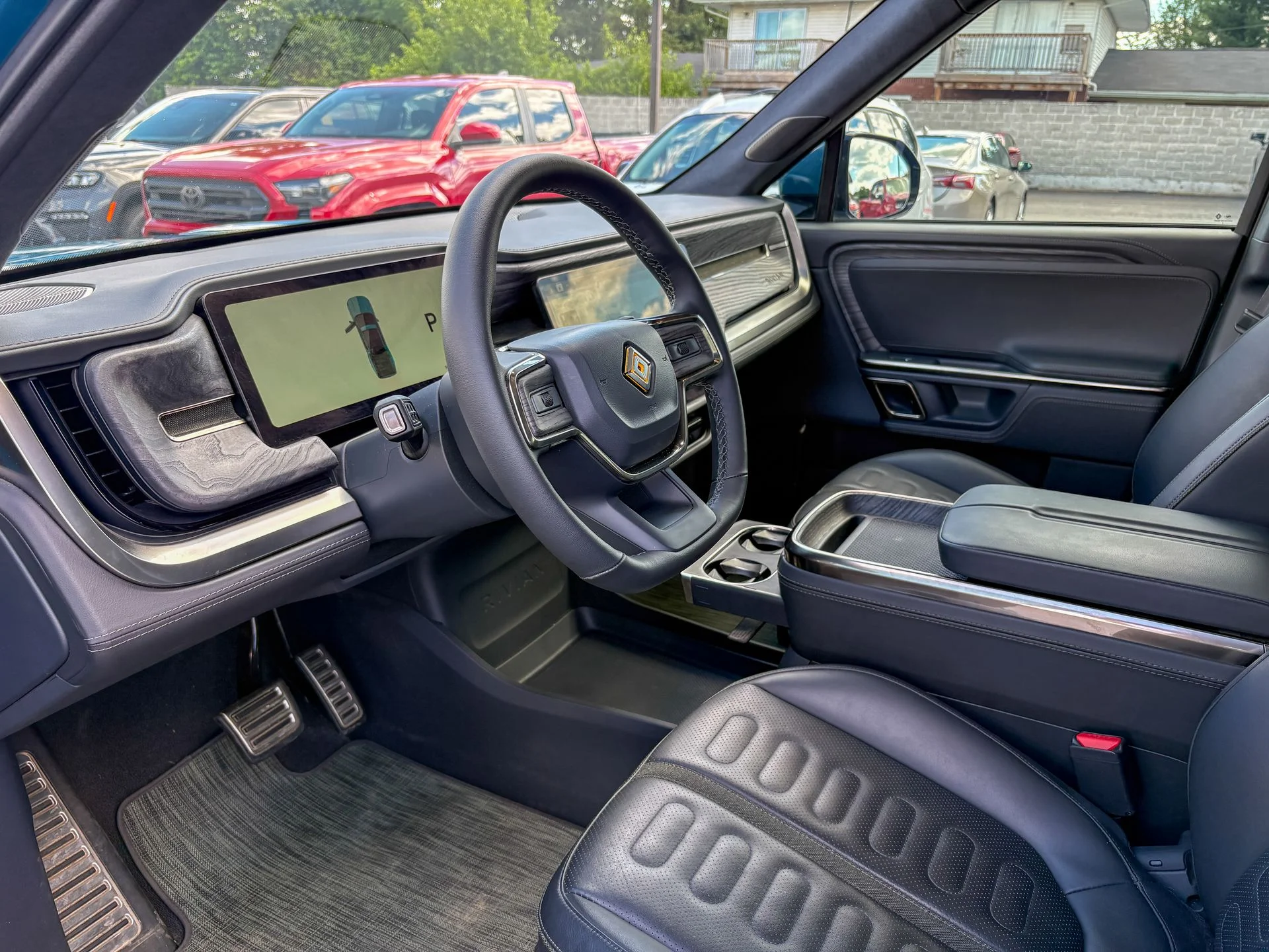 Used 2022 Blue Rivian Adventure image 2