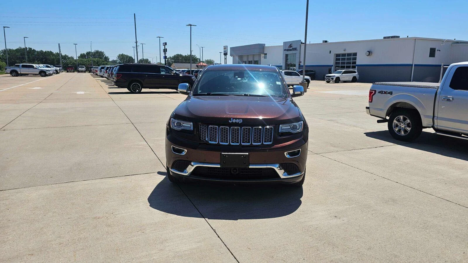 Used 2014 Jeep Grand Cherokee Summit with VIN 1C4RJFJG8EC572782 for sale in Charles City, IA