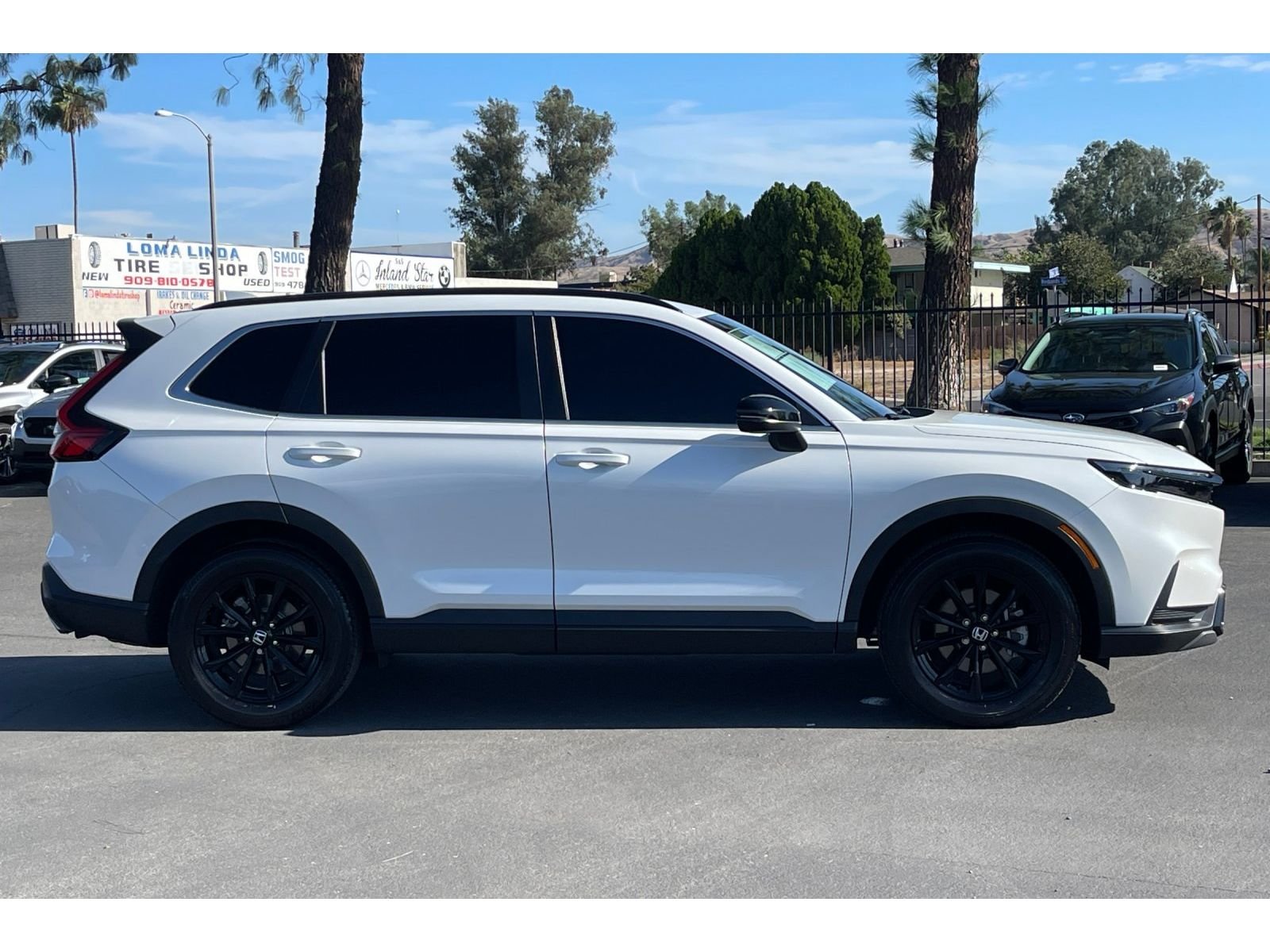 Used 2024 Platinum White Pearl Honda Sport image 7