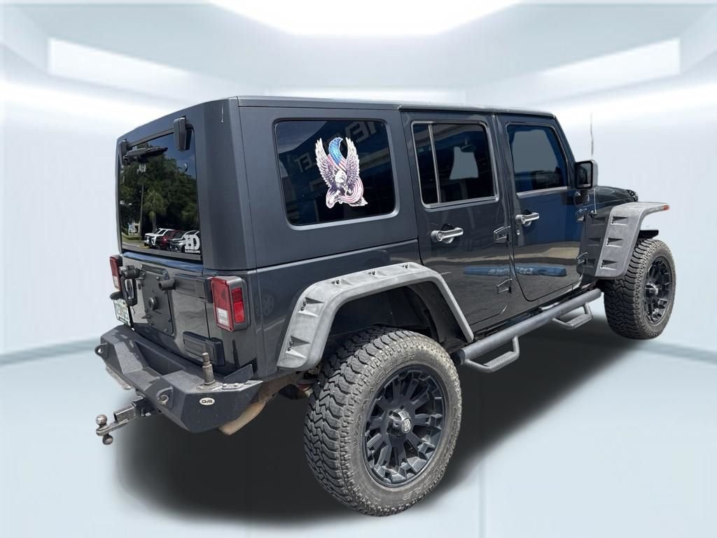 Used 2010 Gray Jeep Unlimited Sport image 11