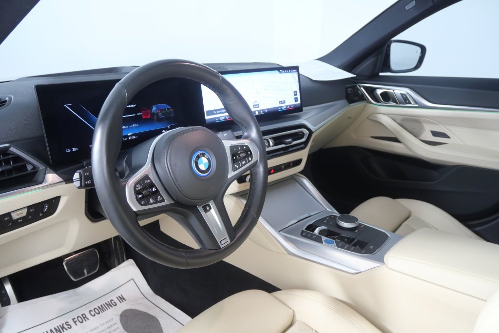 Certified Used 2024 Green Metallic BMW eDrive40 image 13