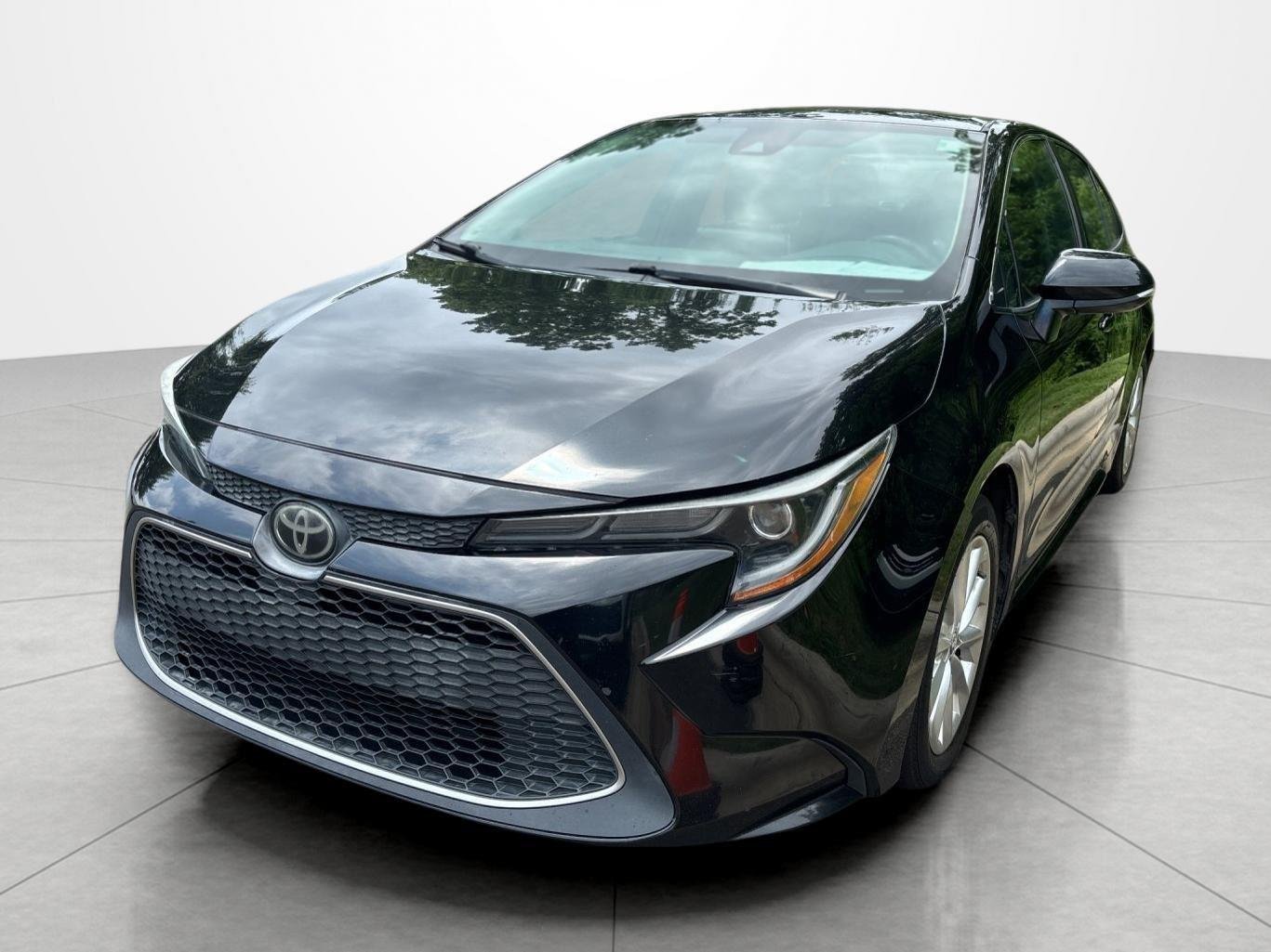 Used 2020 Black Sand Pearl Toyota XLE image 1