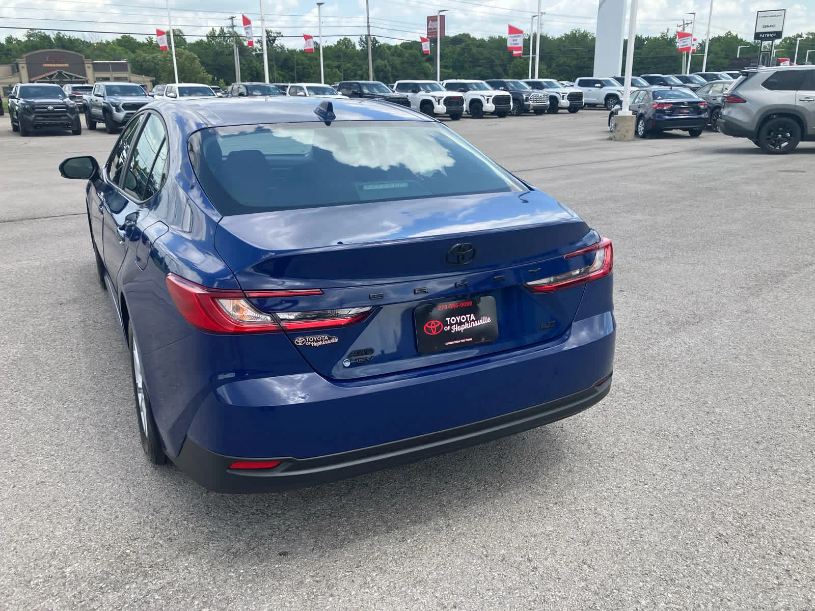 Used 2025 Reservoir Blue Toyota LE image 6