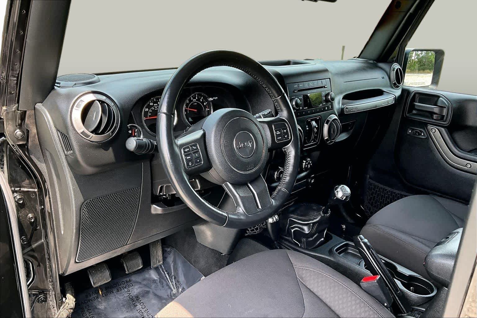 Used 2016 Black Clearcoat Jeep Sport image 18