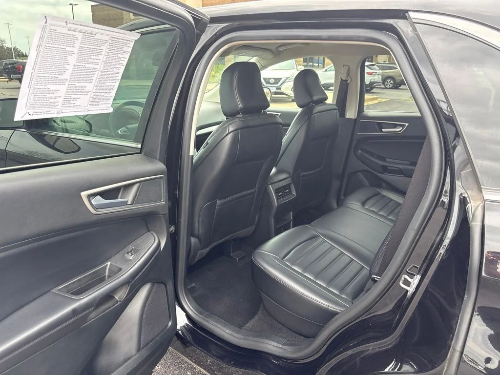 Used 2024 Agate Black Metallic Ford SEL image 23