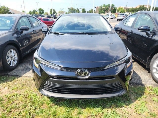 Used 2025 Midnight Black Metallic Toyota LE image 2