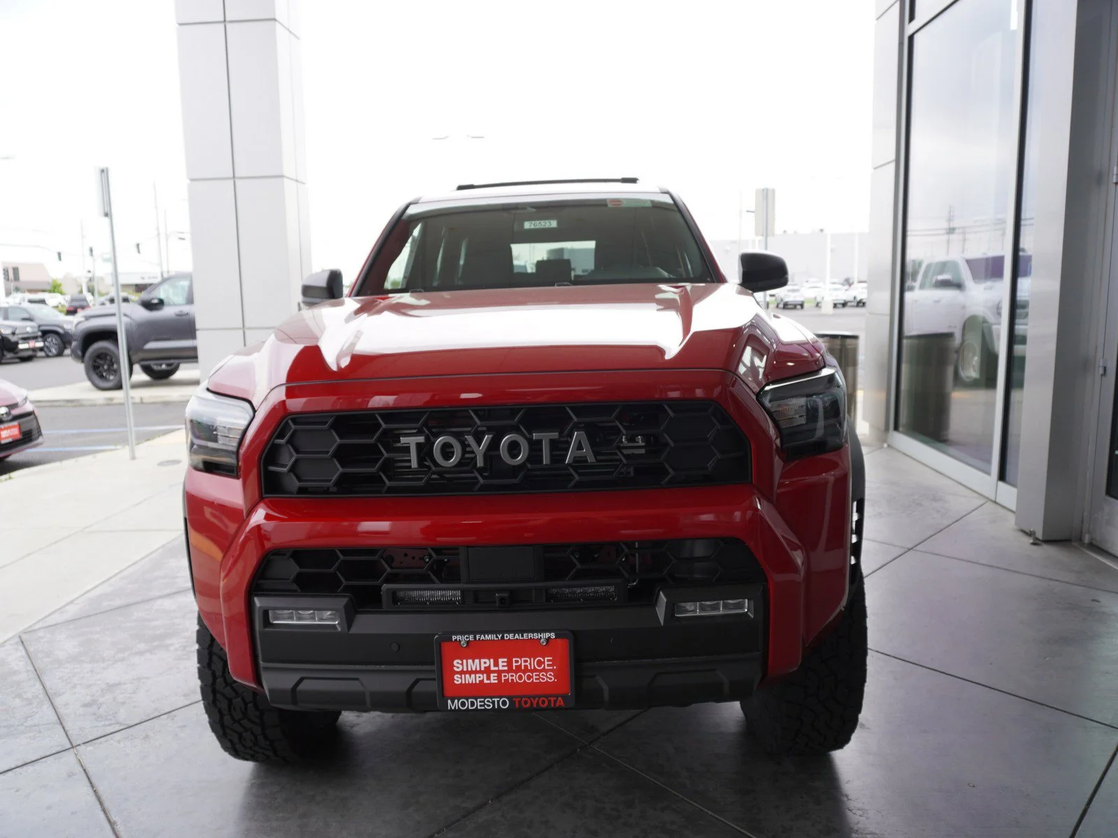 New 2026 Supersonic Red Toyota Hybrid TRD Off Road image 5