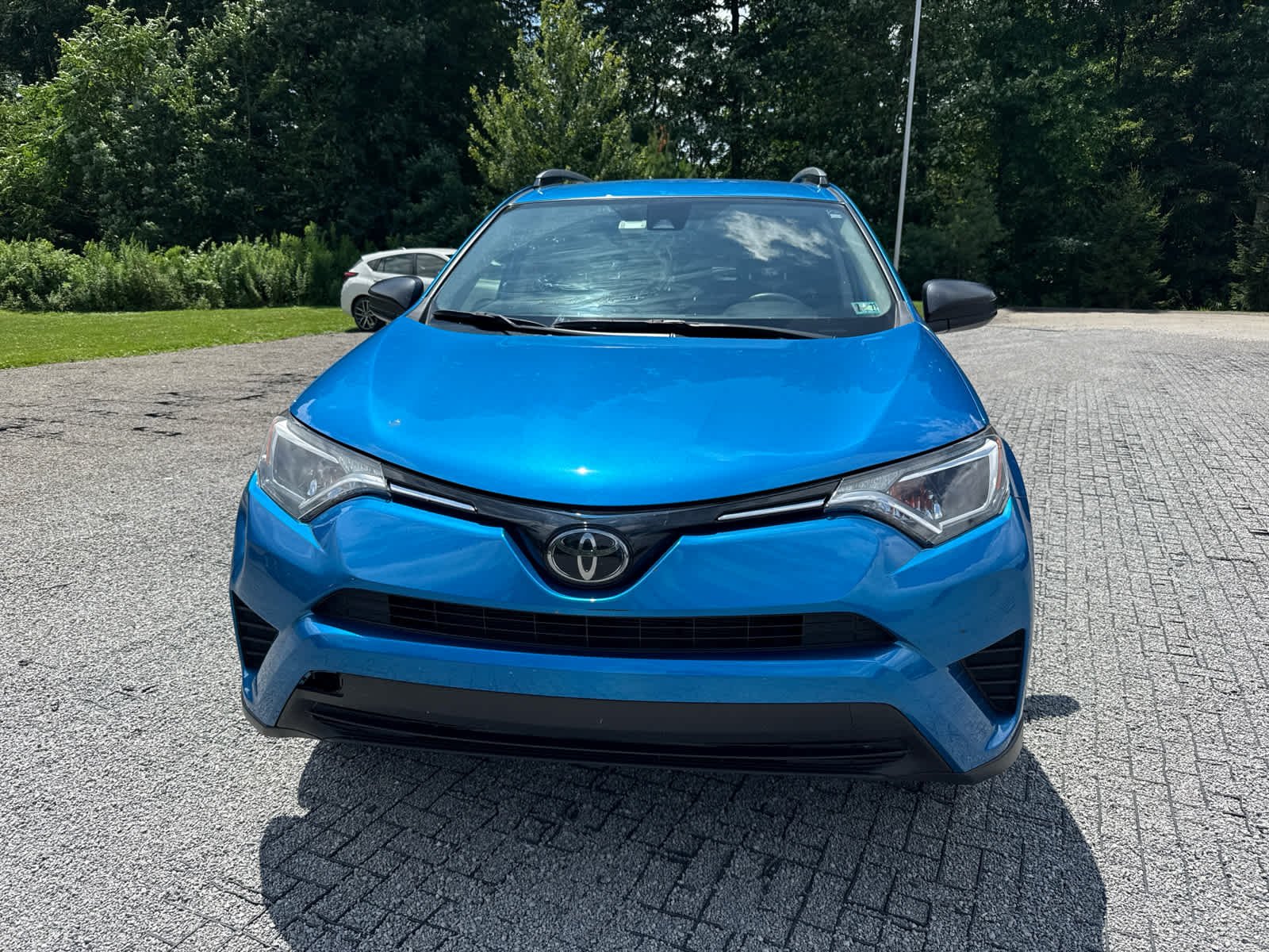 Used 2018 Electric Storm Blue Toyota LE image 2
