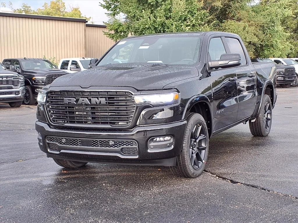 New 2026 Diamond Black Crystal Pearl-Coat Exterior Paint RAM Laramie image 2