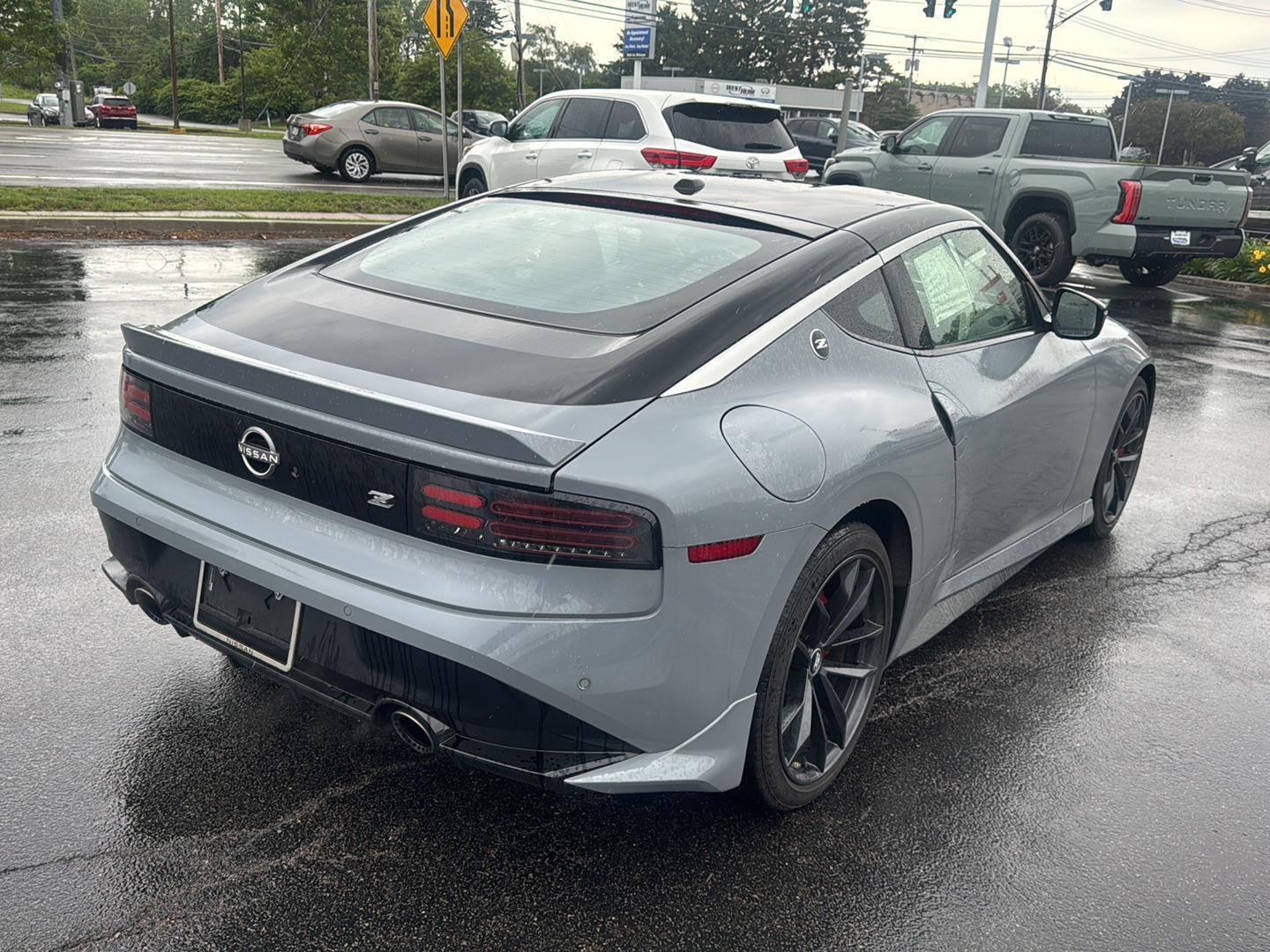 Used 2024 Boulder Gray/Super Black Nissan Performance image 6