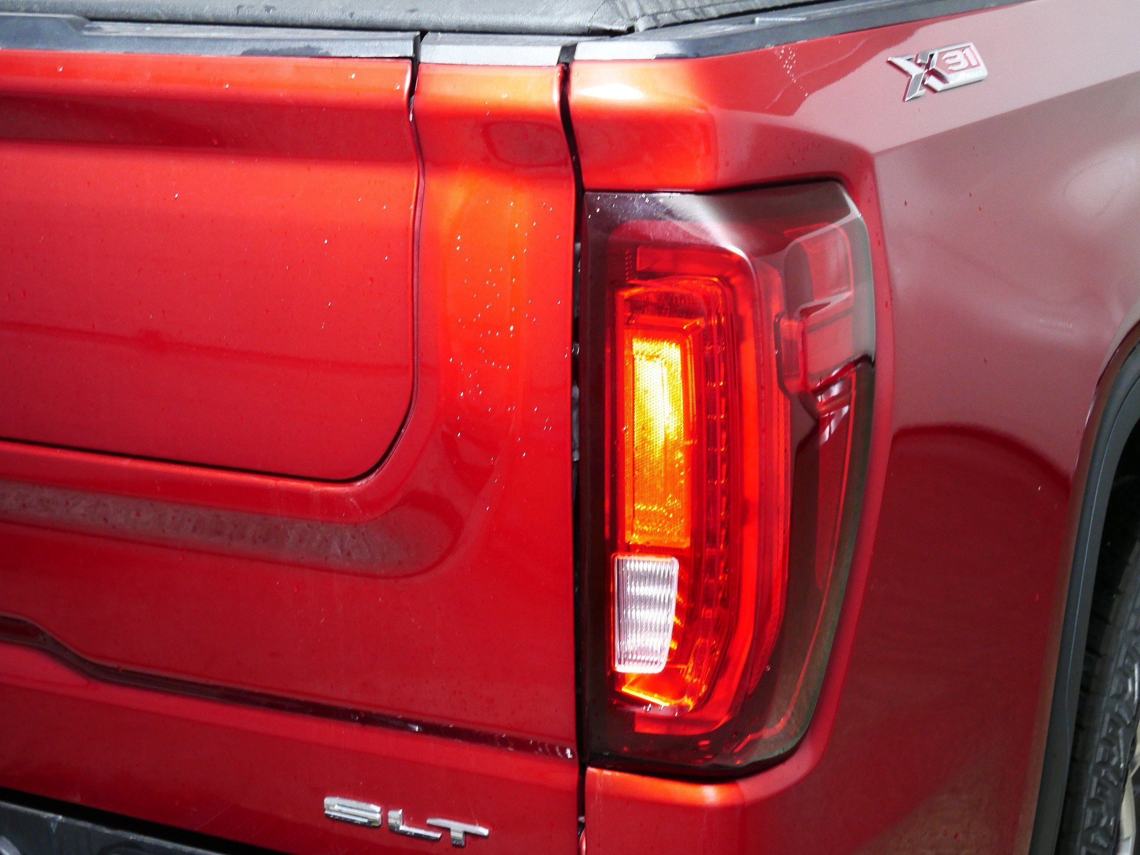 Used 2023 Volcanic Red Tintcoat GMC SLT image 17