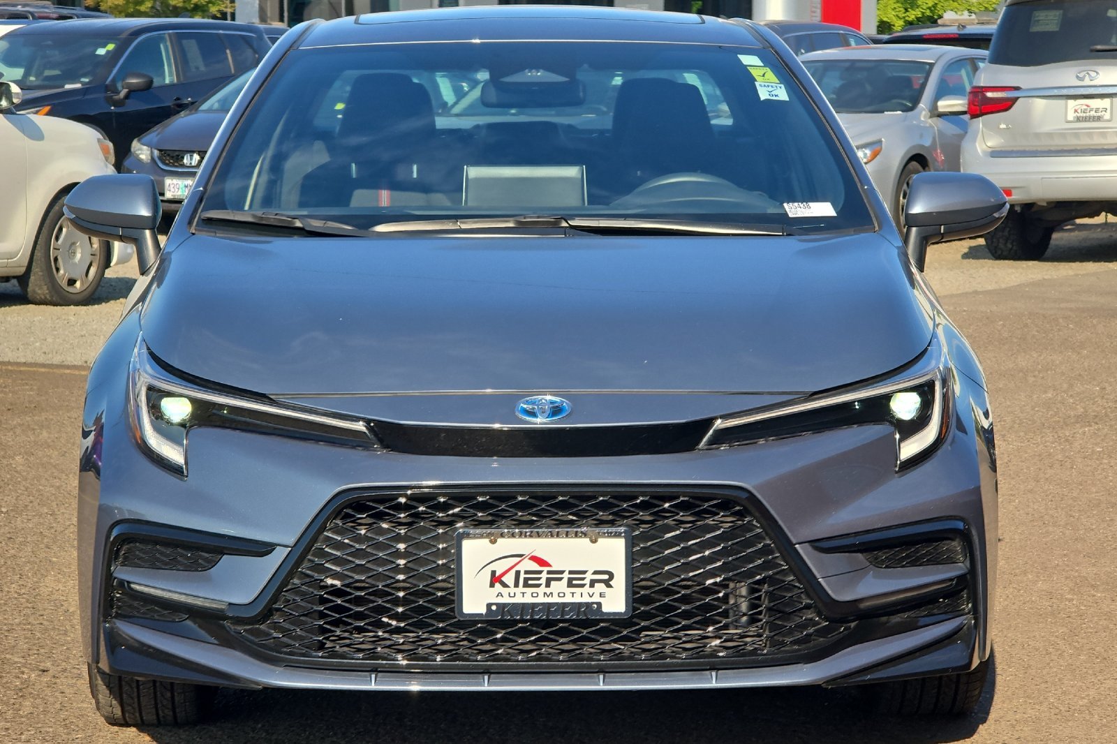 Used 2025 Blue Toyota Hybrid LE image 6