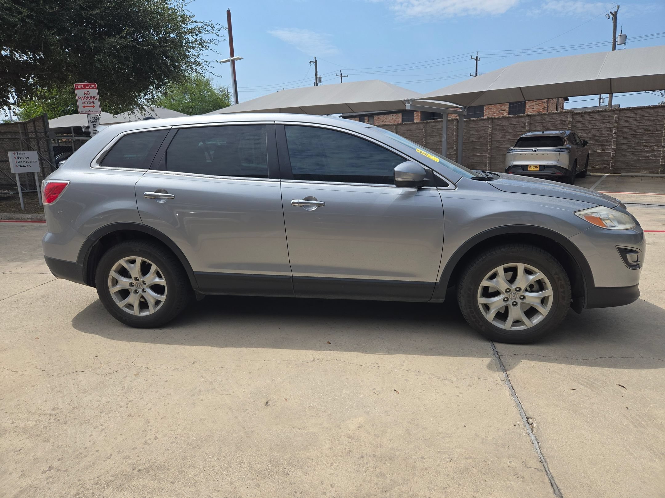 Used 2012 Liquid Silver Metallic Mazda Grand Touring image 2