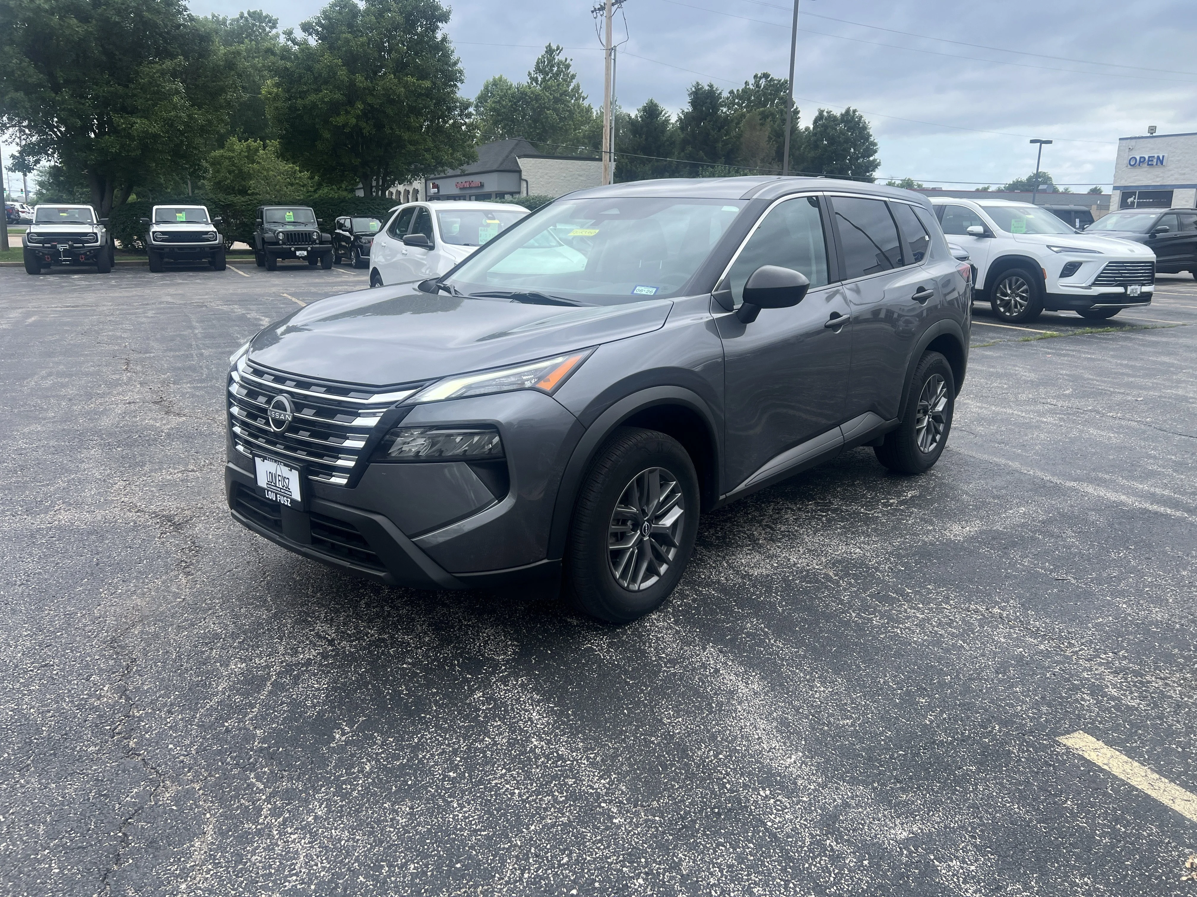 Used 2024 Gun Metallic Nissan S image 4