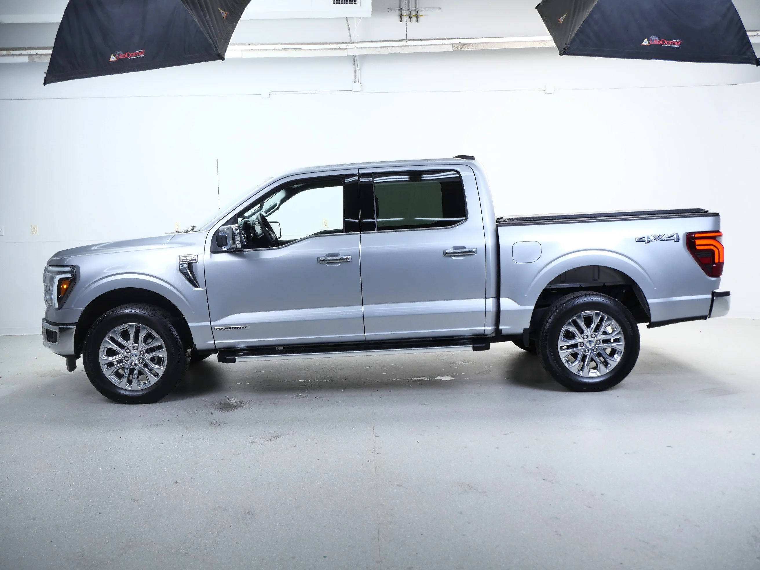 Used 2025 Iconic Silver Metallic Ford LARIAT 4WD SuperCrew 5.5