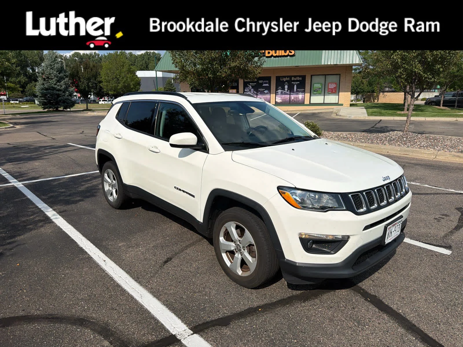 Used 2018 White Clearcoat Jeep Latitude image 1