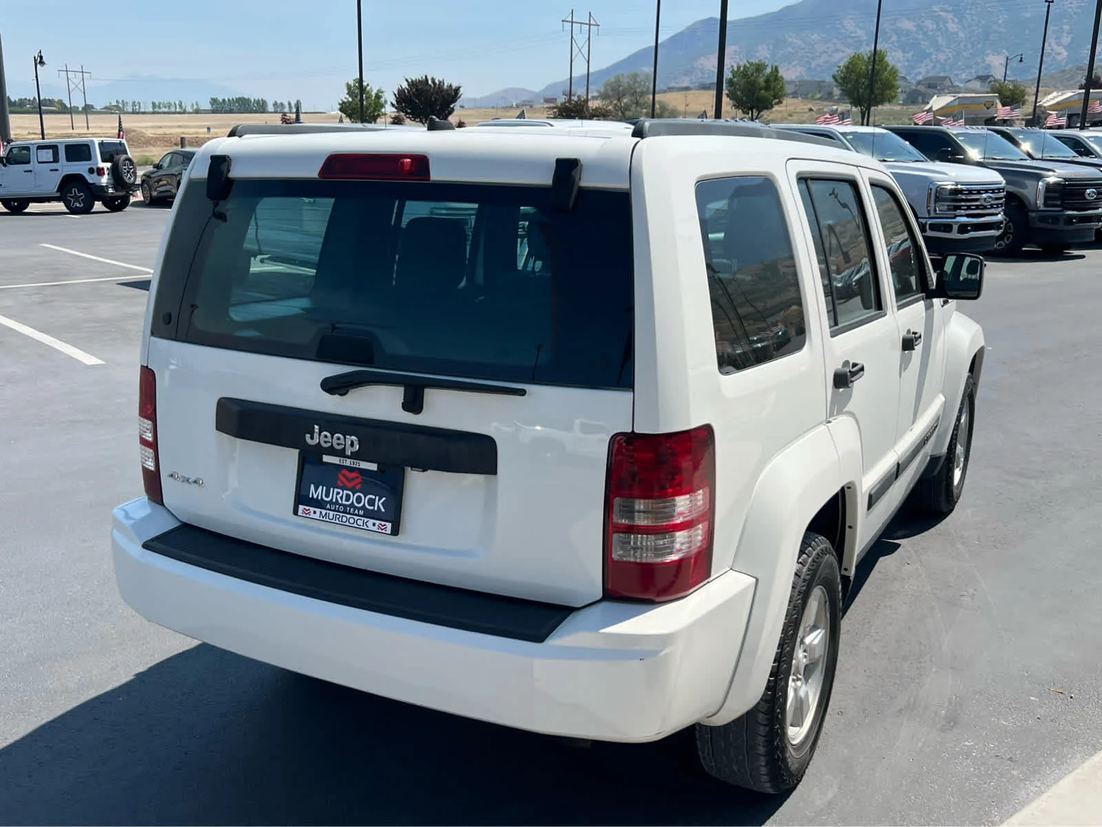 Used 2010 Stone White Clearcoat Jeep Sport image 8