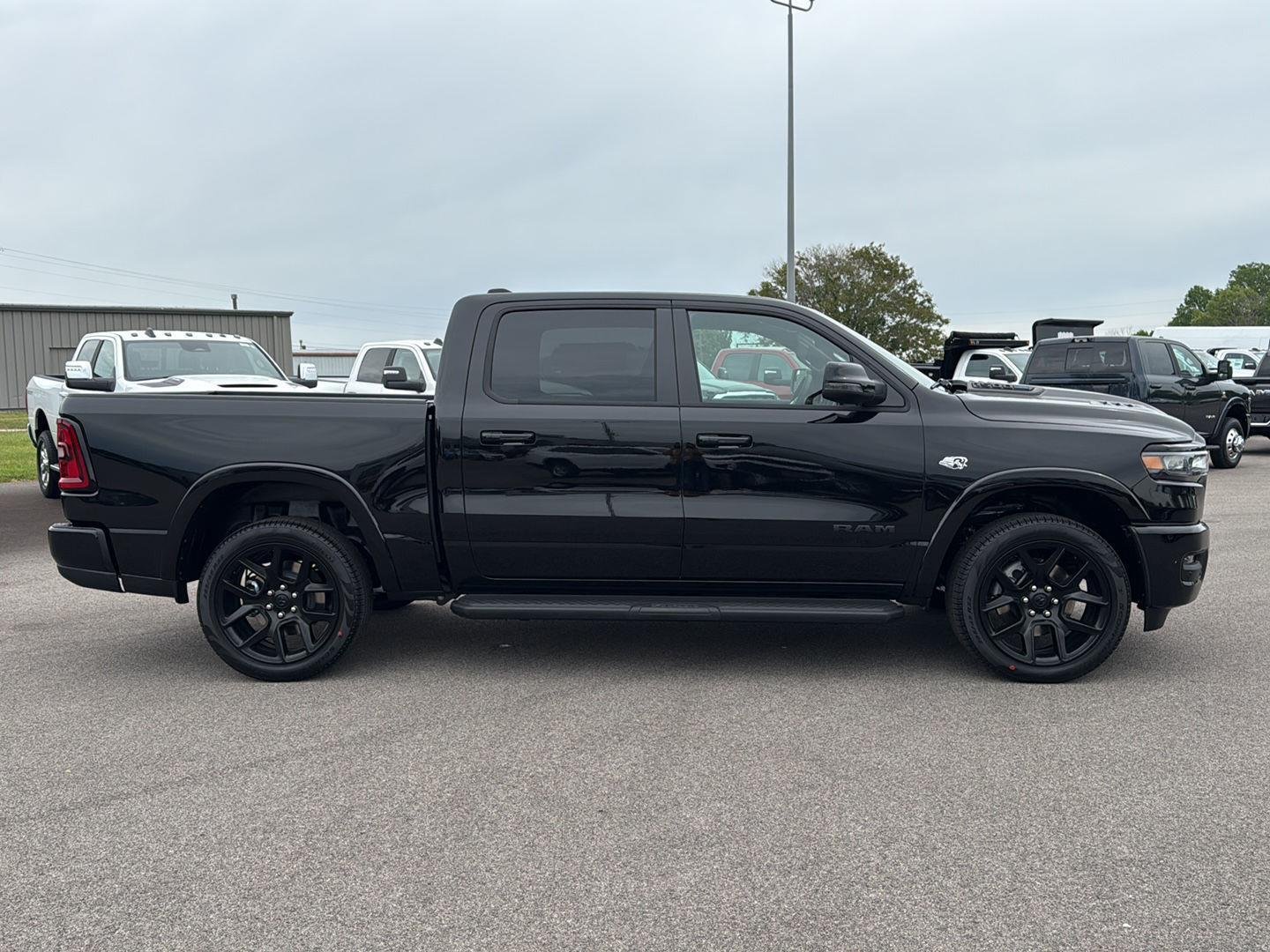 New 2026 Diamond Black Crystal Pearl-Coat Exterior Paint RAM Laramie image 8