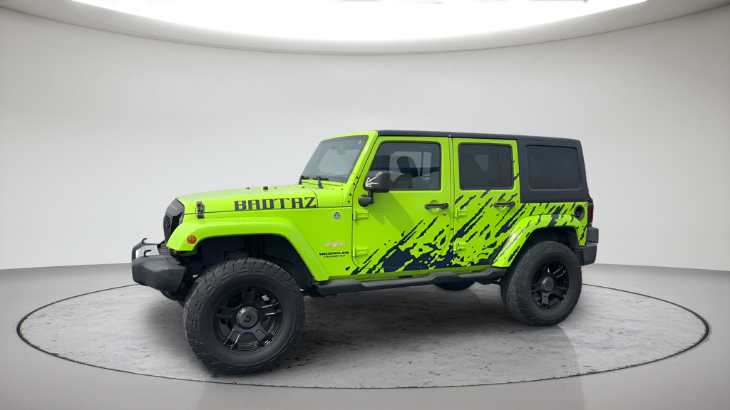 Used 2013 Green Jeep Unlimited Sahara image 9