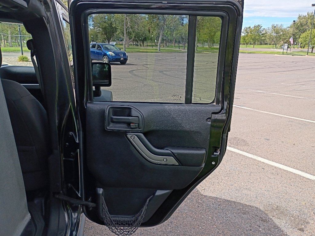Used 2016 Black Clearcoat Jeep Sport image 13