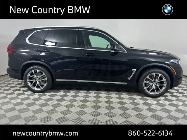 New 2026 Black Sapphire Metallic BMW xDrive40i image 8