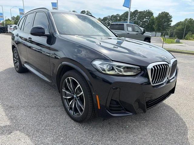 Used 2024 Black BMW sDrive30i image 1