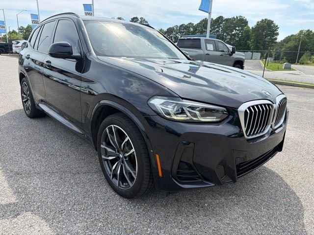 Used 2024 Black BMW sDrive30i image 1