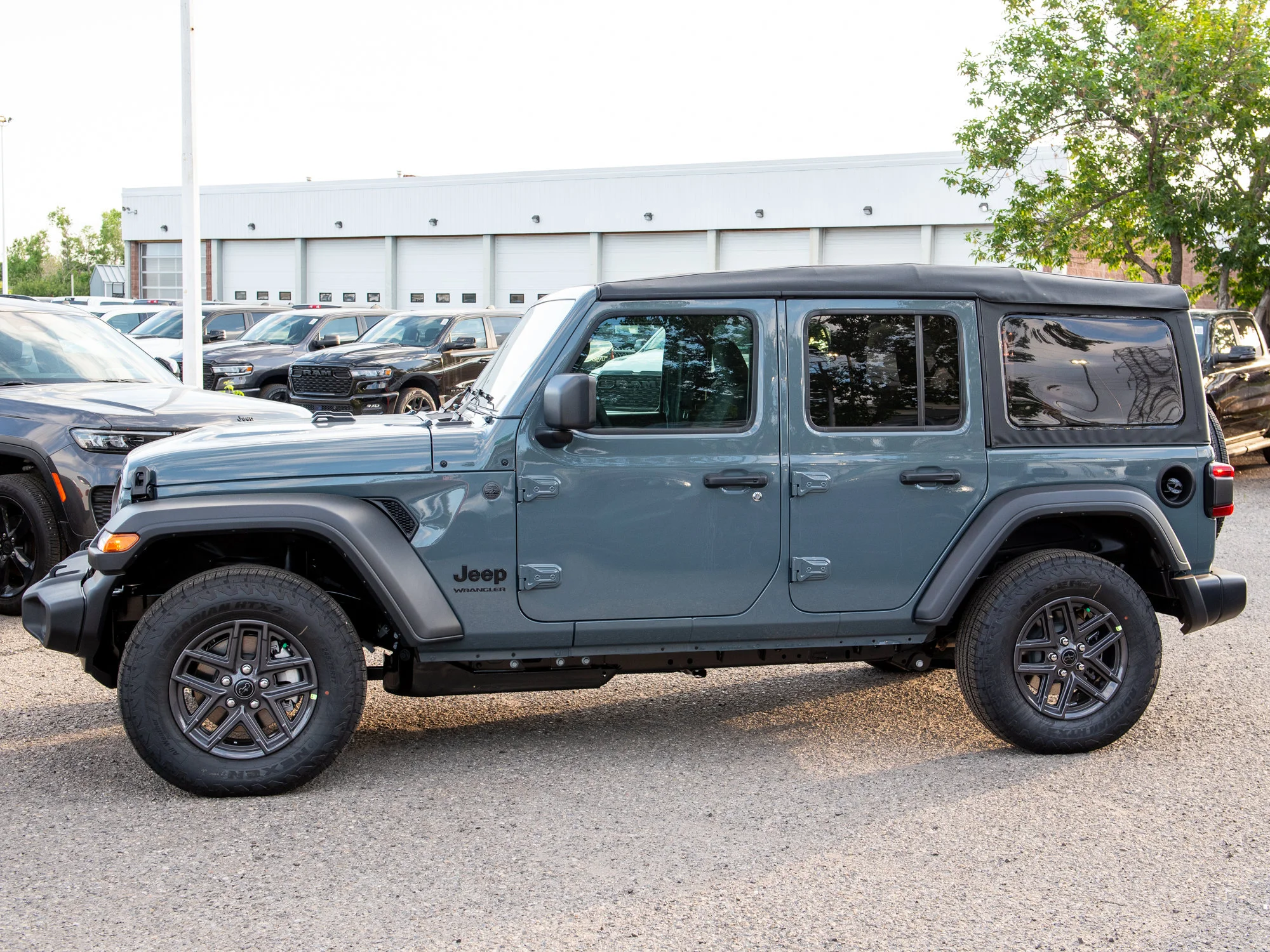 New 2026 Dark blue Jeep Sport S* image 2