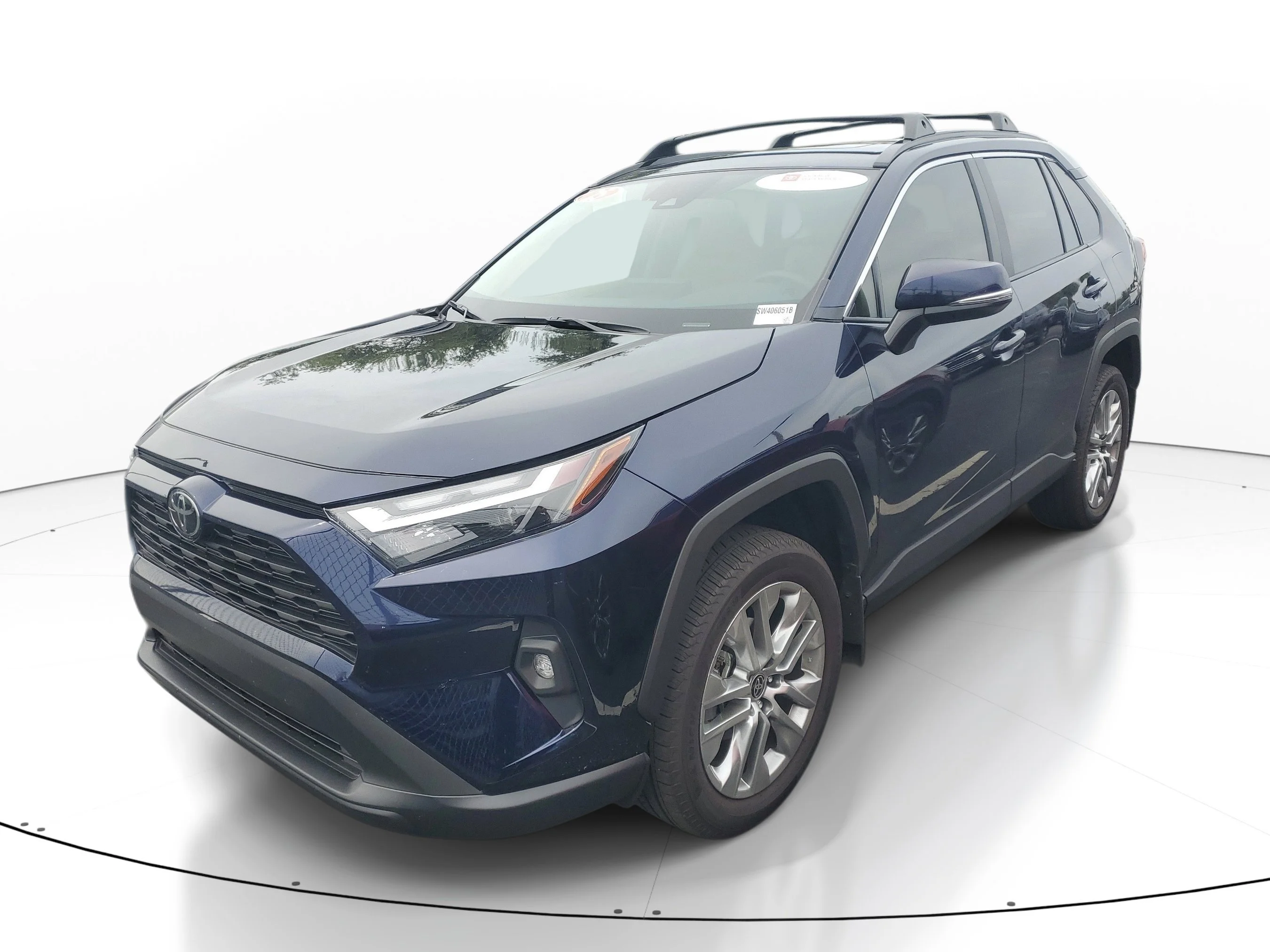Used 2025 Midnight Black Metallic Toyota XLE Premium image 2