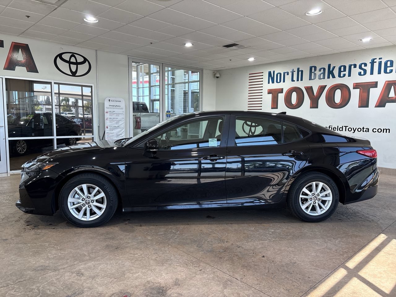 Certified Used 2025 Midnight Black Metallic Toyota LE image 7