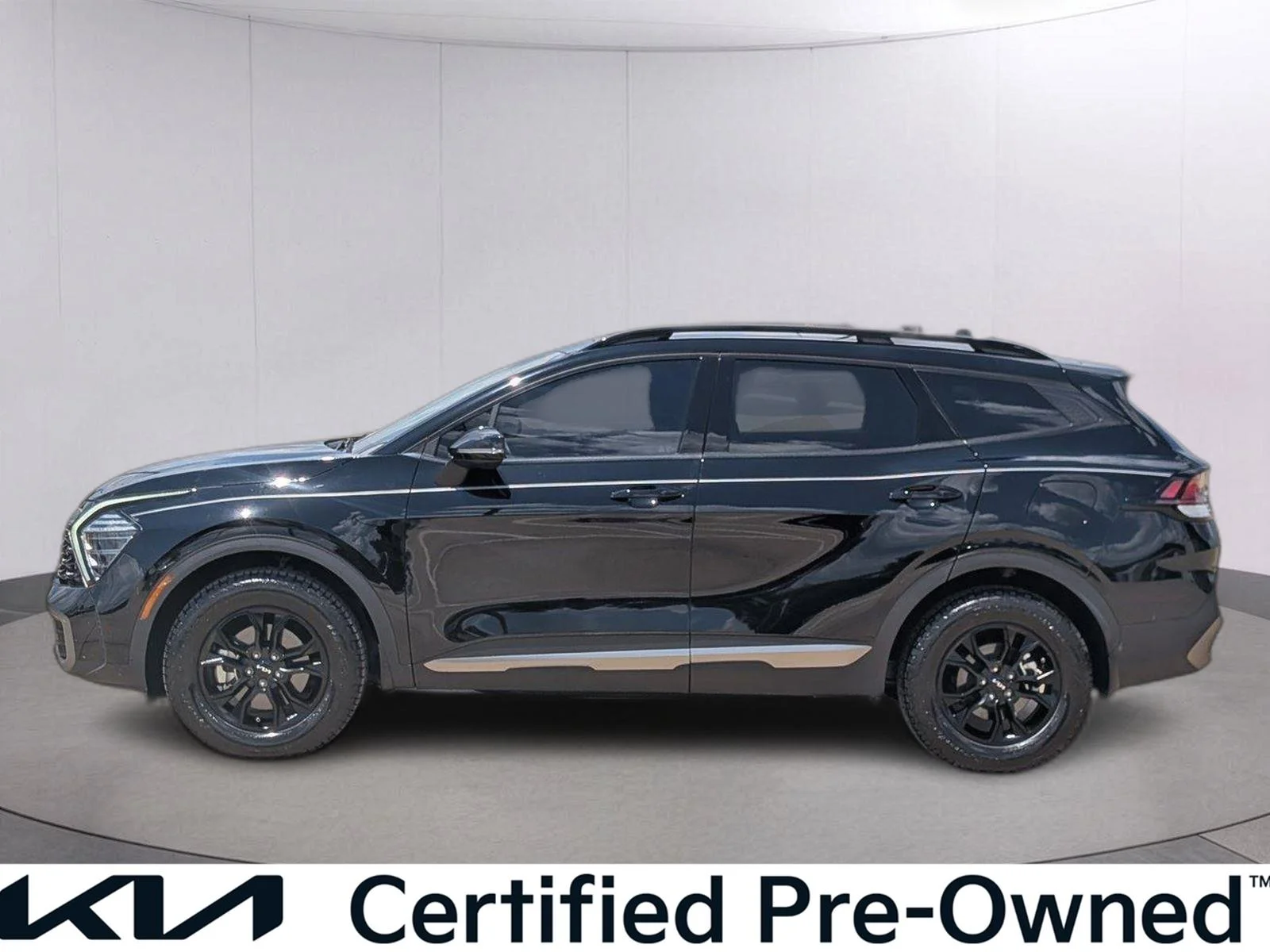 Used 2024 Ebony Black Kia X-Pro image 2
