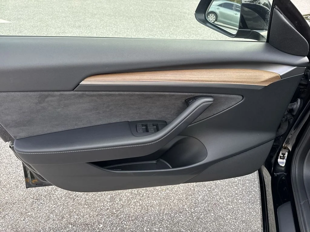 Used 2023 Solid Black Tesla  image 39